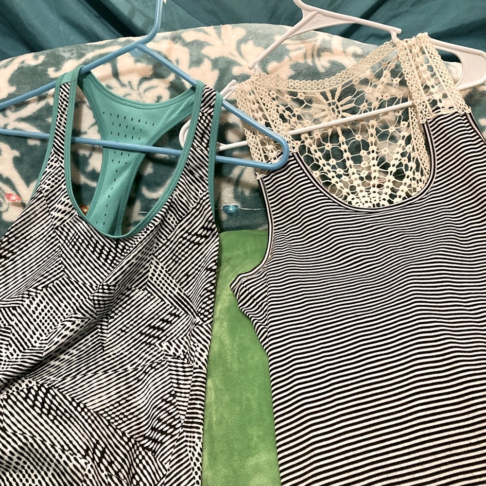 Two razor back cut tank tops